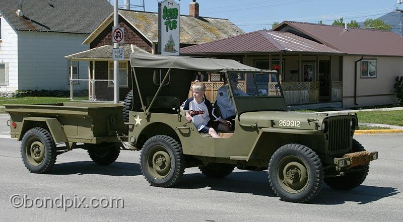 Deer-Lodge-Parade_14666.jpg - WW2 army vehicles vehicles drive along Main Street during the Territorial Days Parade in Deer Lodge Montana, June 14th 2008