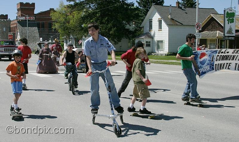 Deer-Lodge-Parade_14817.jpg - Skateboarders promoting the Deer Lodge Skate Park skate along Main Street during the Territorial Days Parade in Deer Lodge Montana, June 14th 2008