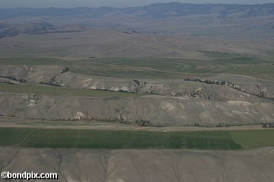Aerial views over the Deer Lodge valley, Deer Lodge, Anaconda and Butte in Montana