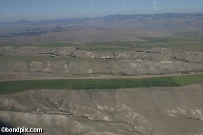 Aerial views over the Deer Lodge valley, Deer Lodge, Anaconda and Butte in Montana