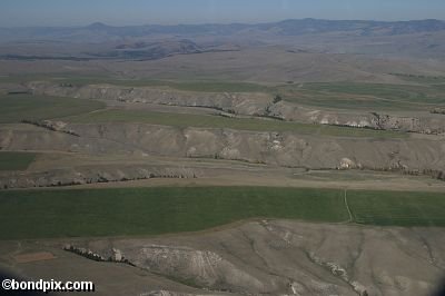 Aerial views over the Deer Lodge valley, Deer Lodge, Anaconda and Butte in Montana