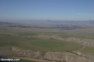 Aerial views over the Deer Lodge valley, Deer Lodge, Anaconda and Butte in Montana