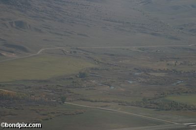 Aerial views over the Deer Lodge valley, Deer Lodge, Anaconda and Butte in Montana
