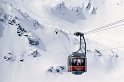 Cable car ascending towards Piz Gloria in the Swiss Alps
